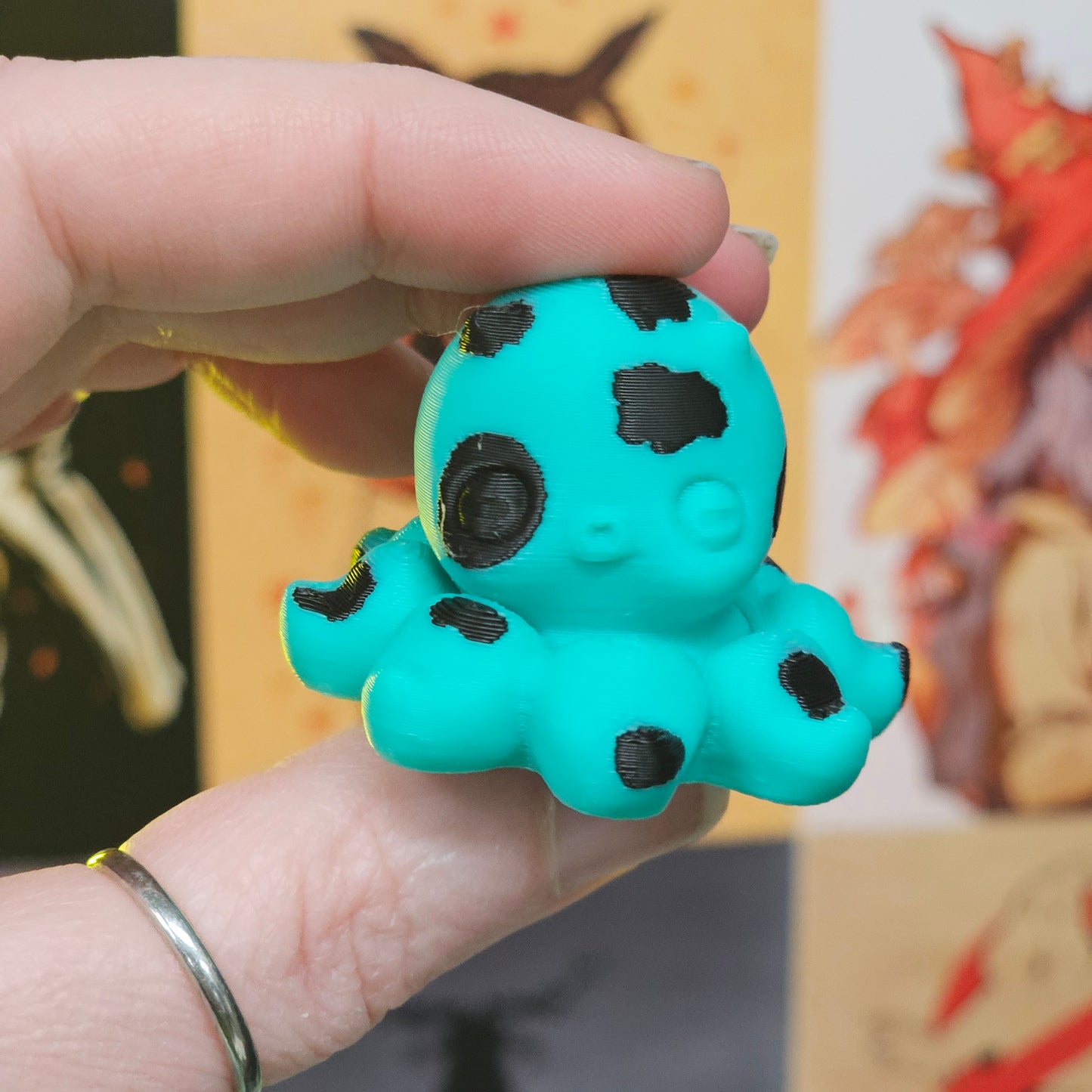 Spotted Like a Cow Octo Spinner – Turquoise & Black 3D Printed Fidget