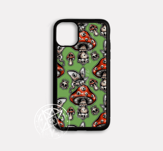 Image of a phone case with a green background image on top of the image has red topped mushrooms with skulls on it and the base of the mushroom, has skull bugs around the image and a white moth with a skull on each wing.