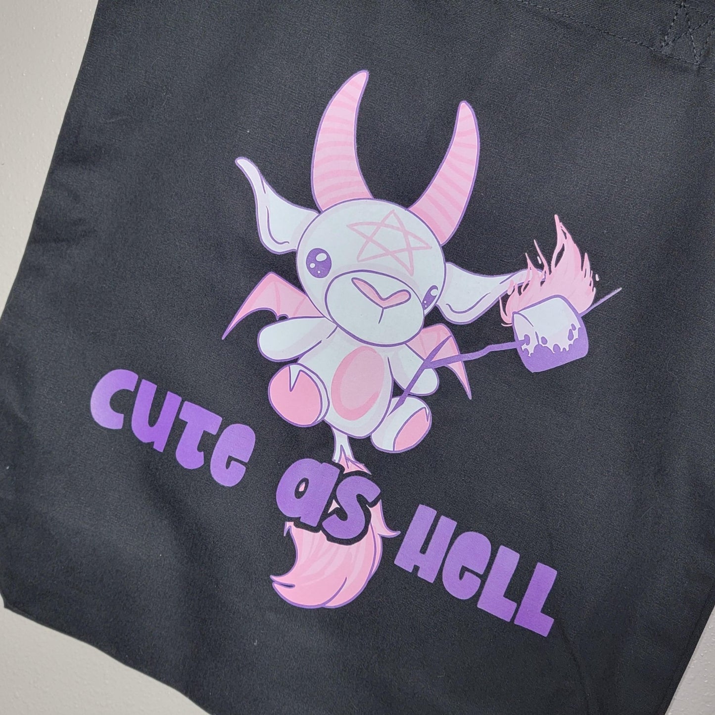 Cute as Hell Tote Bag mockup - Playful pink devil goat on black canvas