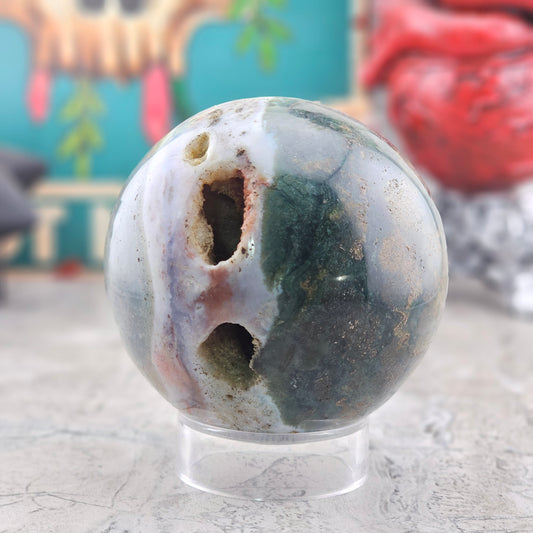 Ocean Jasper Sphere with Natural Vugs / Druzy Pockets