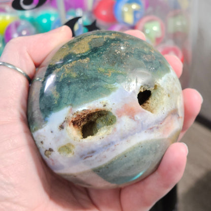 Ocean Jasper Sphere with Natural Vugs / Druzy Pockets