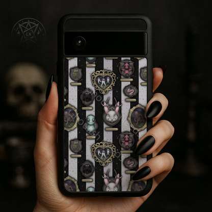 Phone case with a black and white striped design featuring various Cryptids held by a hand.