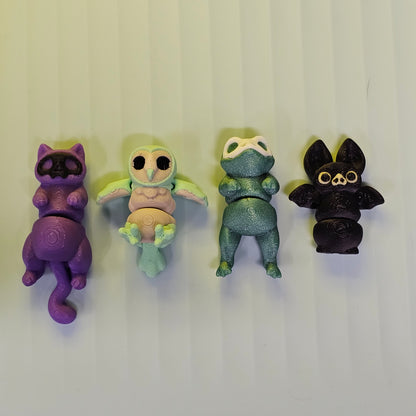 Darklings Pets: Purple Cat, Owl, frog and bat. 