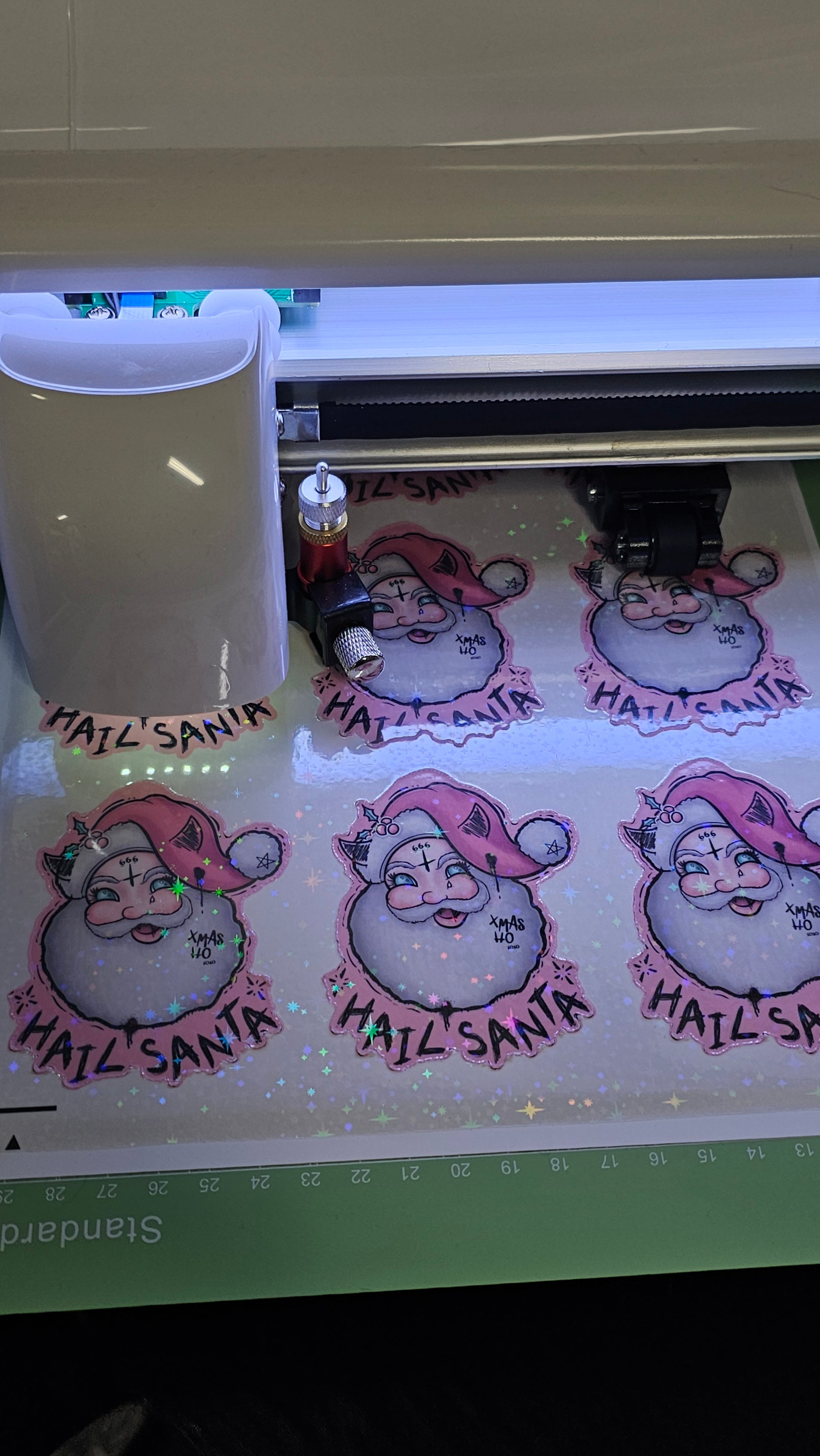 Hail Santa Magnet being cut with Juliet machine