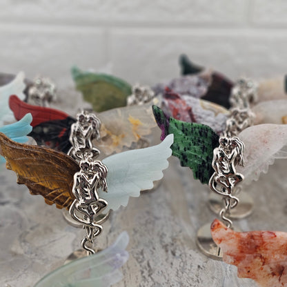 More random options of Angel and Devil Stone wing Carvings and Metal Figurine