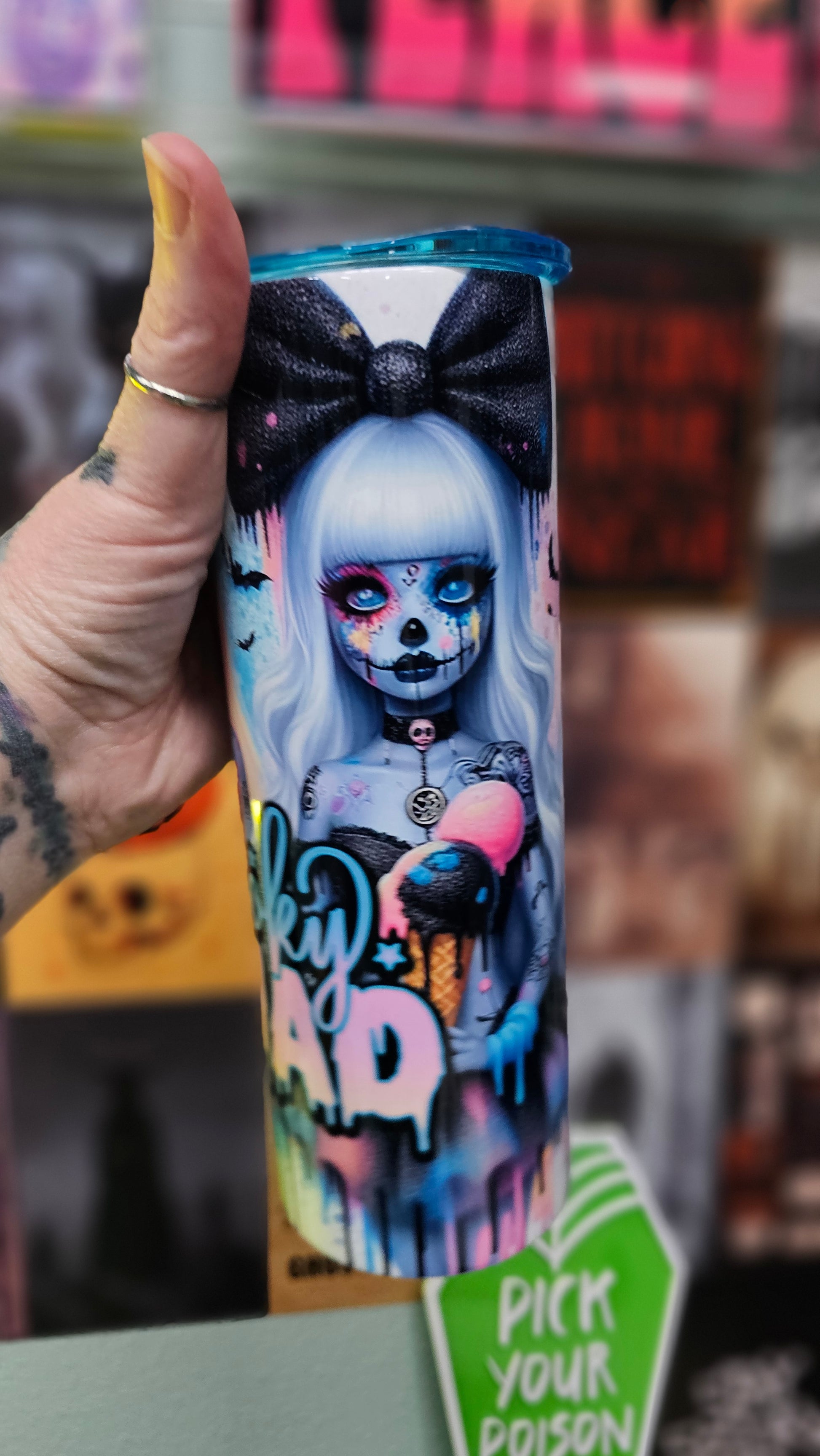 Holding tumbler showing side angle - Spooky Squad - double insulated 20oz tumbler
