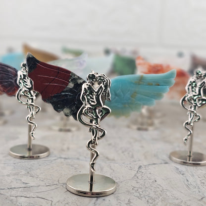 Silver stand with two different stone carved wings - Angel and Devil Stone wing Carvings and Metal Figurine