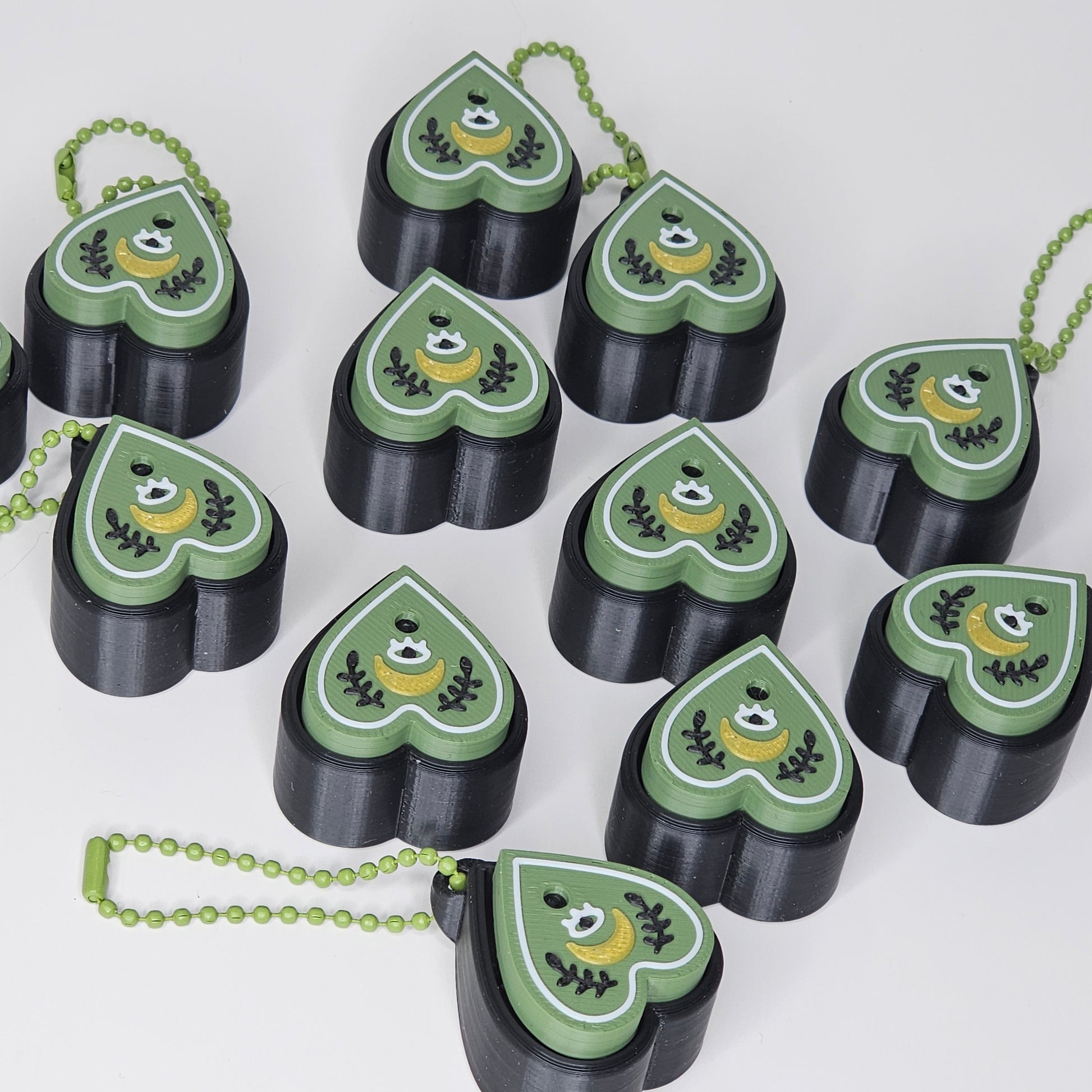 planchette keychain clickers laid out