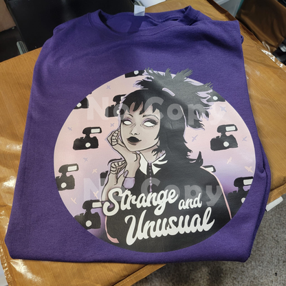 Strange and Unusual Unisex T-shirt