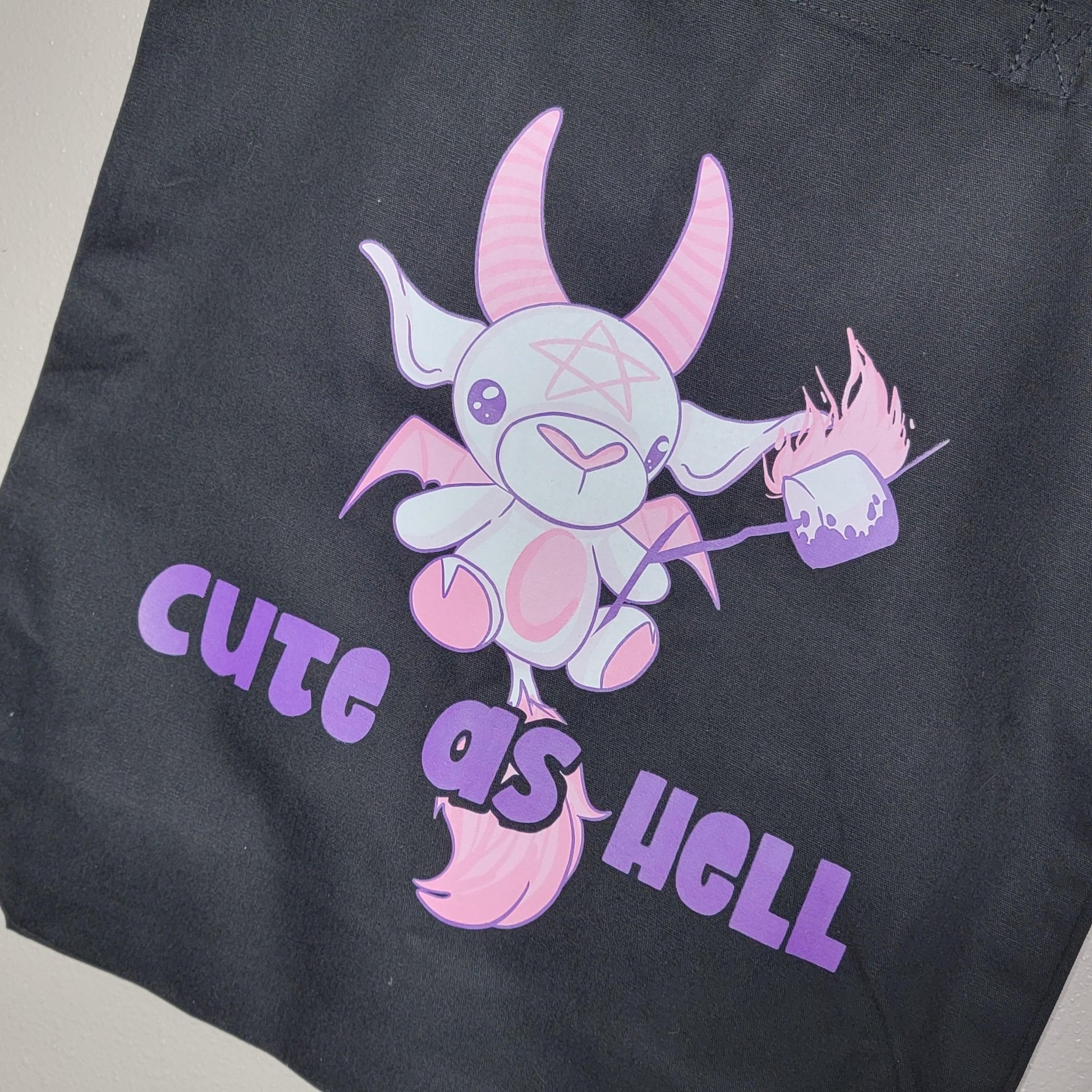Cute as Hell Tote Bag mockup - Playful pink devil goat on black canvas