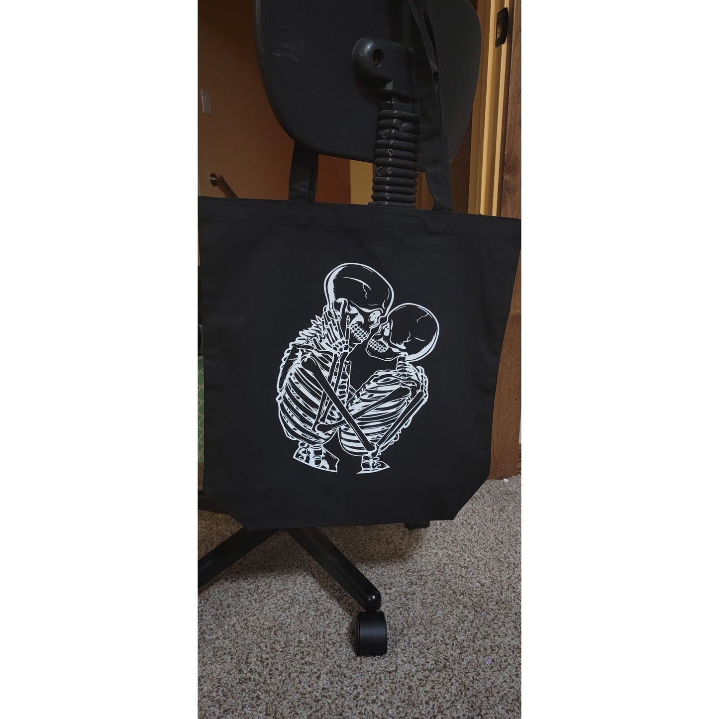 Lovers Tote Bag mockup - Skeleton couple embracing on black canvas