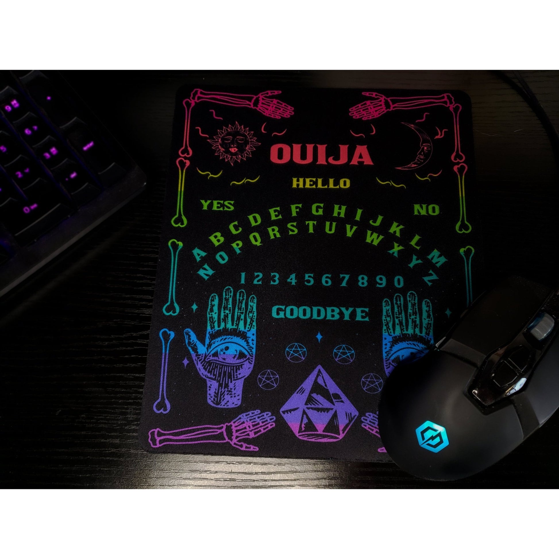 Rainbow Ouija Mousepad - Vibrant rainbow planchette design with soft rubber bas